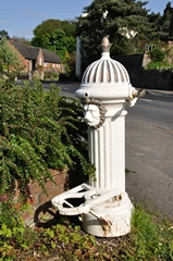 Landscape scene of Ticknall Village Water Tap. Link to Water Wells, Fountains & Features Gallery.