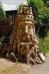 A Dead Tree Carving of Neptune Sea God. Link to Sculptures and Carvings Gallery.